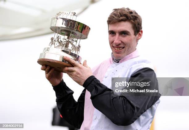 Jack Kennedy poses with the trophy after winning the Betway Paddy Power Stayers Hurdle on board Teahupoo during day three of the Cheltenham Festival...