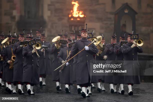 Pipers and musicians from The Royal Scots Dragoon Guards play during the Beating Retreat ceremony on the Esplanade of Edinburgh Castle to mark the...