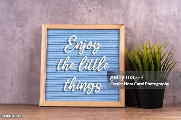 enjoy the little things text on letter board - words of wisdom stock pictures, royalty-free photos & images