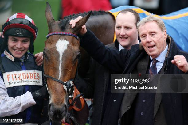 Ben Jones celebrates with Owner Harry Redknapp after winning the TrustATrader Plate Handicap Chase on board Shakem Up'arry during day three of the...