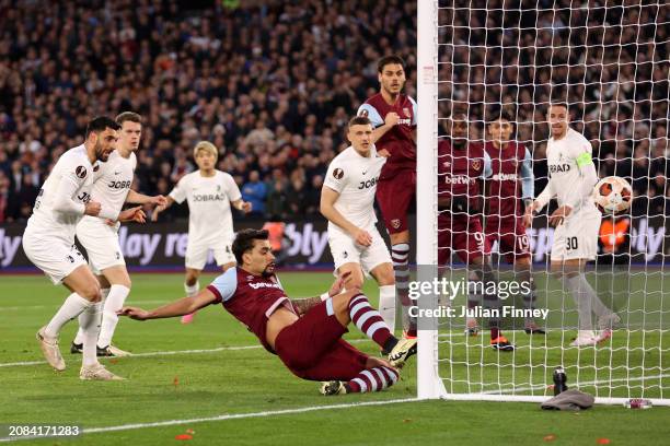 Lucas Paqueta of West Ham United scores his team's first goal during the UEFA Europa League 2023/24 round of 16 second leg match between West Ham...