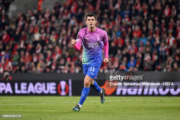 Christian Pulisic of AC Milan celebrates scoring his team's first goal during the UEFA Europa League 2023/24 round of 16 second leg match between...