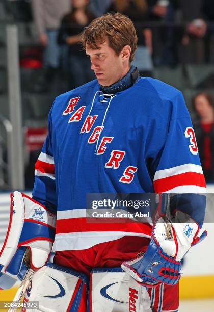 Mike Dunham of the New York Rangers skates against the Toronto Maple Leafs during NHL game action on December 13, 2003 at Air Canada Centre in...