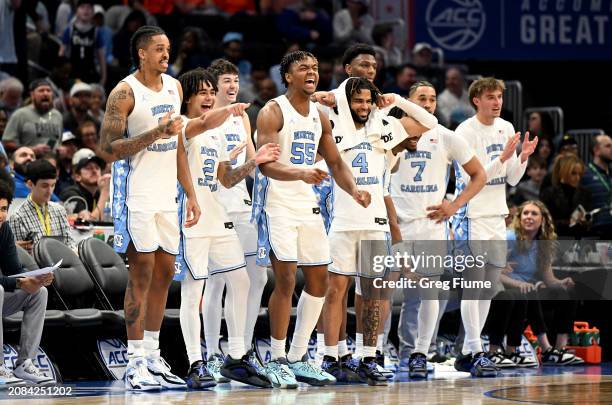 The North Carolina Tar Heels bench celebrates in the second half against the Florida State Seminoles in the Quarterfinals of the ACC Men's Basketball...