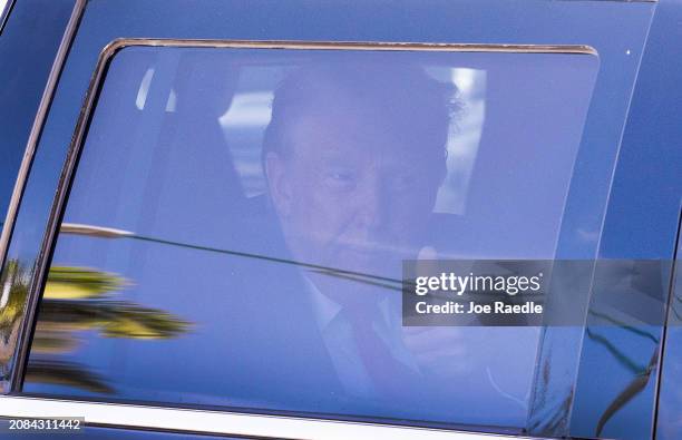 Former U.S. President Donald Trump is driven from the Alto Lee Adams Sr. U.S. Courthouse on March 14, 2024 in Fort Pierce, Florida. Trump visited the...