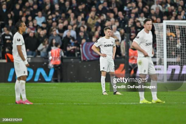 Matthias Ginter of SC Freiburg looks dejected during the UEFA Europa League 2023/24 round of 16 second leg match between West Ham United FC and...