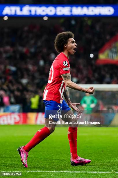 Axel Witsel of Atletico de Madrid celebrates with his teammates after winning Internazionale during the UEFA Champions League 2023/24 round of 16...