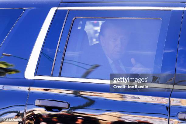 Former U.S. President Donald Trump is driven from the Alto Lee Adams Sr. U.S. Courthouse on March 14, 2024 in Fort Pierce, Florida. Trump visited the...