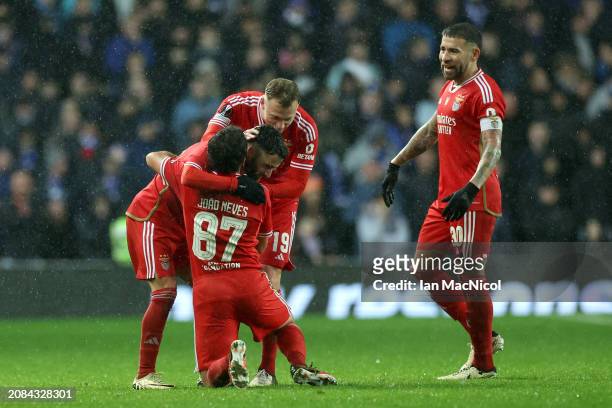 Rafa of SL Benfica celebrates scoring his team's first goal with teammates during the UEFA Europa League 2023/24 round of 16 second leg match between...