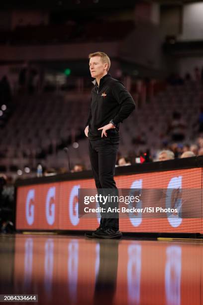 Head coach Eric Konkol of the Tulsa Golden Hurricane looks on during the AAC Men's Basketball Championship - second round game between East Carolina...