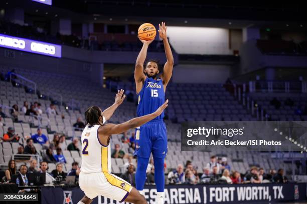 Jared Garcia of the Tulsa Golden Hurricane shoots a three pointer during the AAC Men's Basketball Championship - second round game between East...