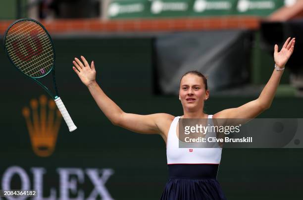 Marta Kostyuk of Ukraine celebrates match point against Anastasia Potapova in their Quarterfinal match during the BNP Paribas Open at Indian Wells...