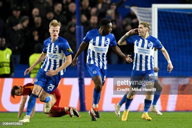 Danny Welbeck of Brighton & Hove Albion celebrates scoring his team's first goal with teammate Julio Enciso during the UEFA Europa League 2023/24...