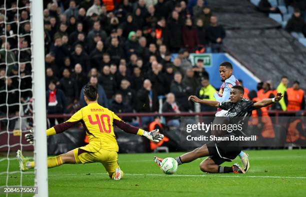 Leon Bailey of Aston Villa scores his team's second goal past Jorrel Hato and Diant Ramaj of Ajax during the UEFA Europa Conference League 2023/24...