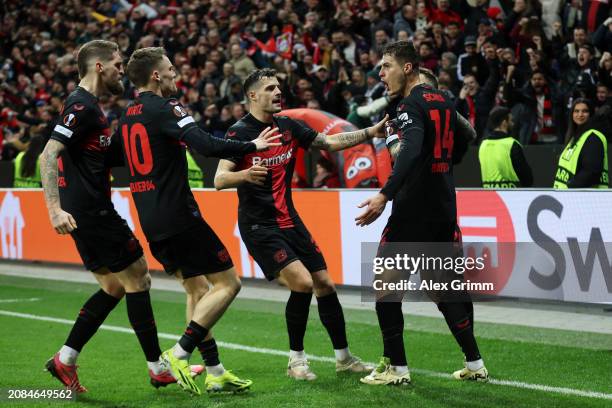 Patrik Schick of Bayer Leverkusen celebrates scoring his team's second goal with teammates during the UEFA Europa League 2023/24 round of 16 second...