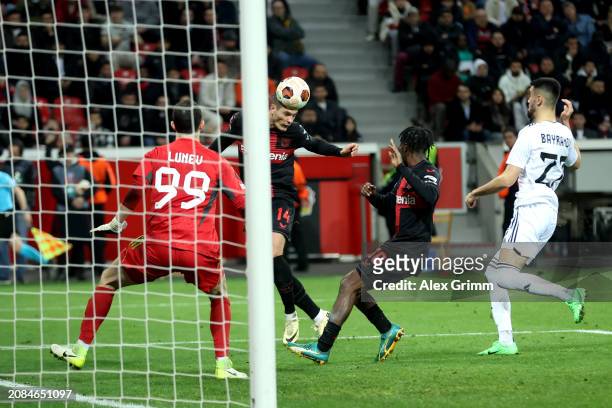 Patrik Schick of Bayer Leverkusen scores his team's third goal during the UEFA Europa League 2023/24 round of 16 second leg match between Bayer 04...