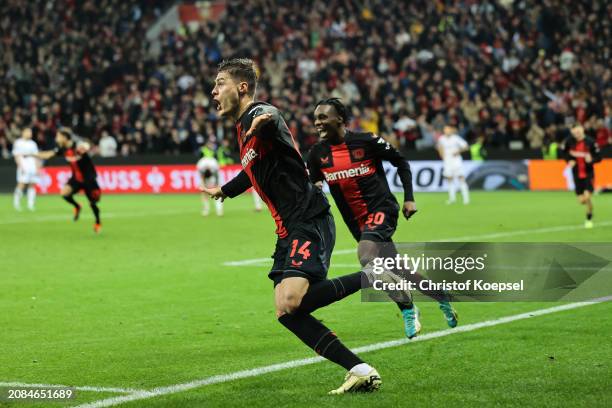 Patrik Schick of Bayer Leverkusen celebrates scoring his team's third goal during the UEFA Europa League 2023/24 round of 16 second leg match between...