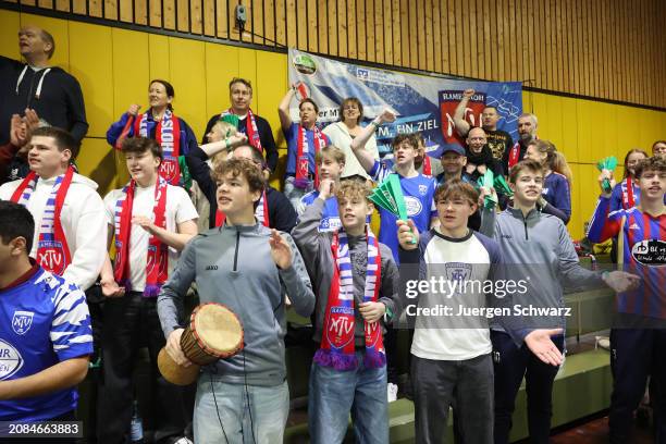 Supporters of MTV Ramelsloh celebrate during the German Futsal Championships for B Juniors 2024 at Sport School Wedau on March 17, 2024 in Duisburg,...
