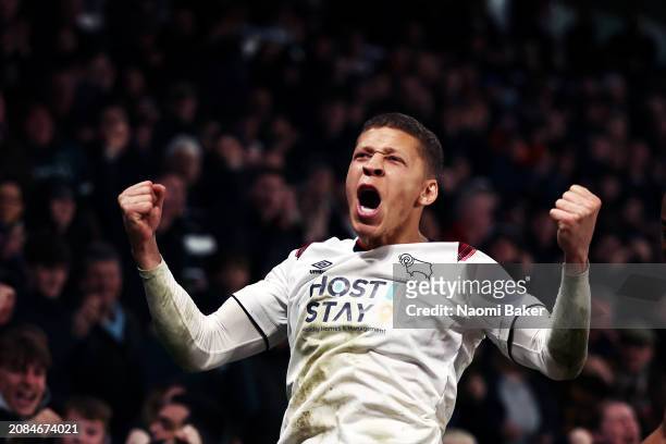 Dwight Gayle of Derby County celebrates after scoring his team's first goal during the Sky Bet League One match between Derby County and Reading at...