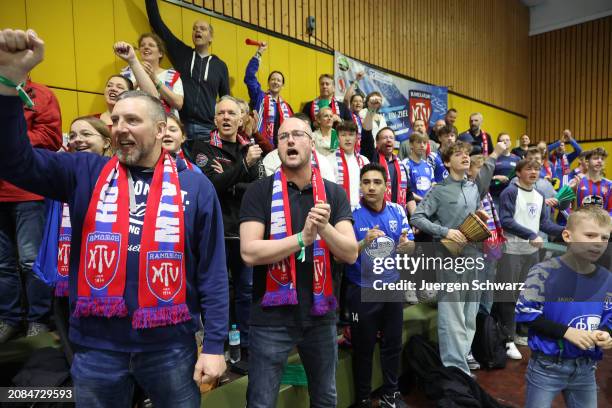 Supporters of MTV Ramelsloh celebrate during the German Futsal Championships for B Juniors 2024 at Sport School Wedau on March 17, 2024 in Duisburg,...