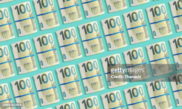 abstract pattern of european union banknotes - one hundred euro note stock pictures, royalty-free photos & images