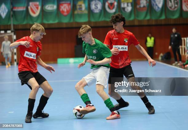Players of Balingen and Hannover compete during the German Futsal Championships for C Juniors 2024 at Sport School Wedau on March 17, 2024 in...