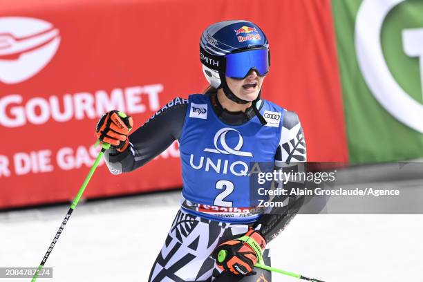 Alice Robinson of Team New Zealand celebrates during the Audi FIS Alpine Ski World Cup Finals Women's Giant Slalom on March 17, 2024 in Saalbach...