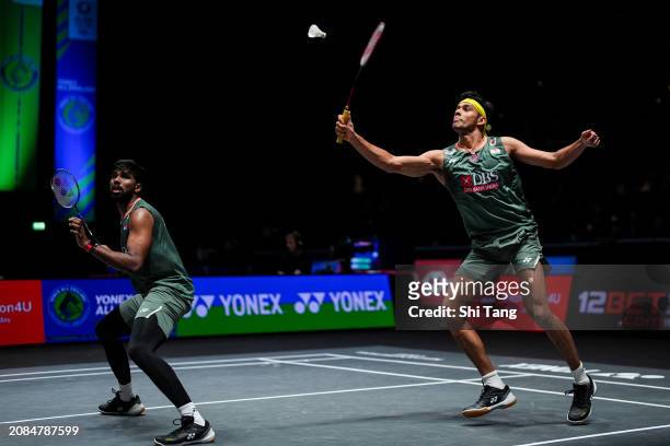 Satwiksairaj Rankireddy and Chirag Shetty of India compete in the Men's Doubles Second Round match against Muhammad Shohibul Fikri and Bagas Maulana...