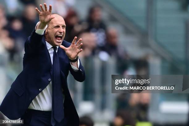 Juventus' Italian coach Massimiliano Allegri reacts during the Italian Serie A football match between Juventus and Genoa at the Allianz Stadium in...