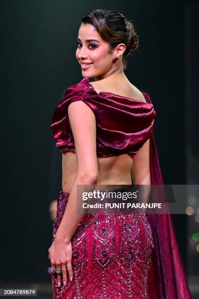 Bollywood actor Jhanvi Kapoor presents a creation by designer house Kalki during the fifth and final day of Lakmé Fashion Week x FDCI in Mumbai on...