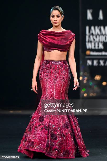 Bollywood actor Jhanvi Kapoor presents a creation by designer house Kalki during the fifth and final day of Lakmé Fashion Week x FDCI in Mumbai on...