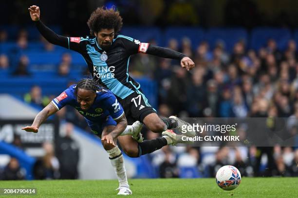 Chelsea's English midfielder Raheem Sterling vies with Leicester City'sEnglish midfielder Hamza Choudhury during the English FA Cup Quarter Final...
