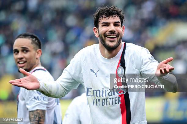 Milan's French defender Theo Hernandez celebrates after scoring his team first goal during the Italian Serie A football match between Hellas Verona...
