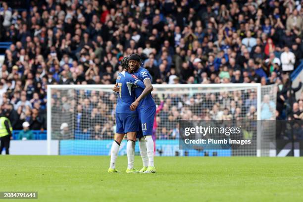 Malo Gusto of Chelsea and Noni Madueke of Chelsea celebrate after the Emirates FA Cup Quarter Final match between Chelsea and Leicester City at...