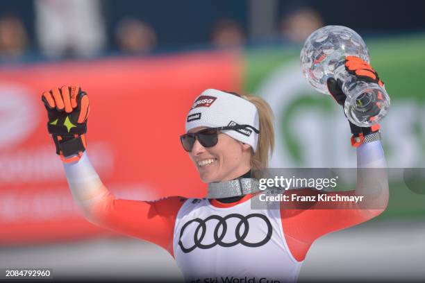 Overall Giant Slalom winner Lara Gut-Behrami of Switzerland celebrates at the Women's Slalom at Audi FIS Alpine Ski World Cup Finals on March 17,...