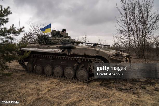 Ukrainian tank-men are seen on a BWP infantry fighting vehicle prepare for combat as the war between Russia and Ukraine continues in the direction of...