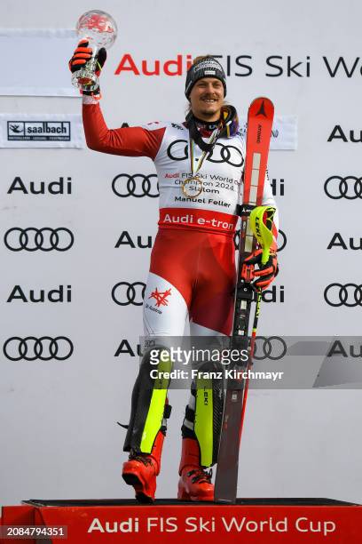 Overall Slalom winner Thea Louise Stjernesund of Norway celebrates at the Men´s Slalom at Audi FIS Alpine Ski World Cup Finals on March 17, 2024 in...