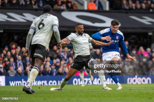 Kieffer Moore is taking a shot on goal during the Sky Bet Championship match between Ipswich Town and Sheffield Wednesday at Portman Road in Ipswich,...