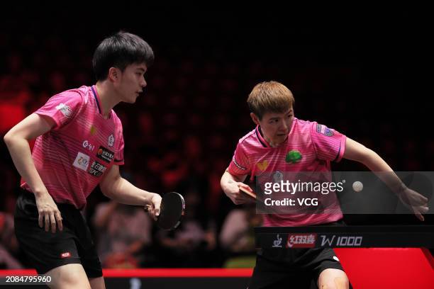 Lin Yun-ju and Chen Szu-Yu of Chinese Taiwan compete in the Mixed Doubles Semifinal match against Sun Yingsha and Wang Chuqin of China on day four of...
