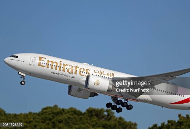 An Emirates Boeing 777-21H is taking off from Barcelona Airport in Barcelona, Spain, on February 29, 2024.