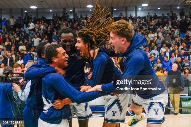 The Yale Bulldogs celebrate the victory after the Ivy League Men's Basketball Championship game between the Brown Bears and the Yale Bulldogs on...