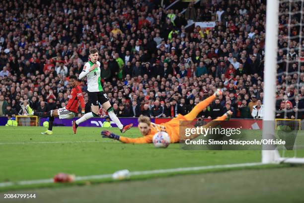 Amad Diallo of Manchester United scores their 4th goal during the Emirates FA Cup Quarter Final match between Manchester United and Liverpool at Old...