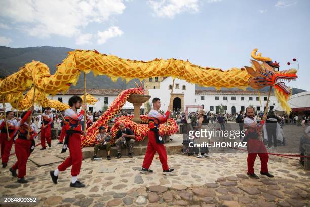 Artists perform the dragon dance during the XXVII Astronomy Festival that brings together astronomy professionals and enthusiasts to share knowledge...