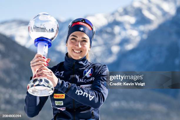 Lisa Vittozzi of Italy with the trophy for the total world cup score after the Women 12.5 km Mass Start at the BMW IBU World Cup Biathlon on March...