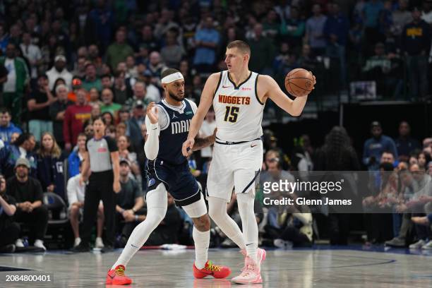 Nikola Jokic of the Denver Nuggets handles the ball during the game handles the ball during the game against the Dallas Mavericks on March 17, 2024...