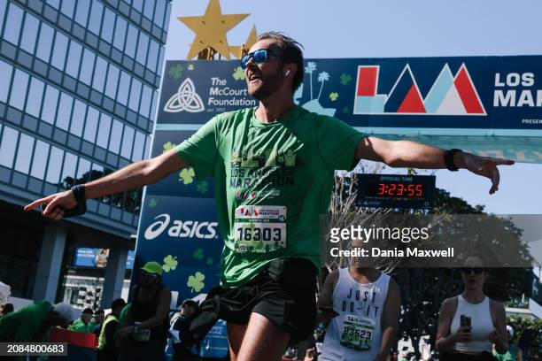Los Angeles, CA Jente De Peuter crosses the finish line during the 39th running of the Los Angeles Marathon presented by ASICS on Sunday, March 17,...