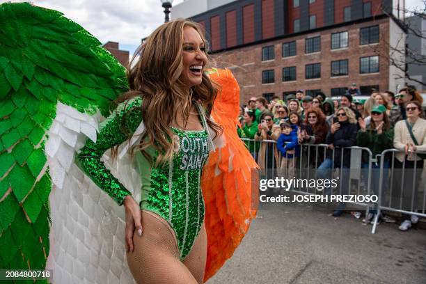 Person dressed as a Southie Saint marches during the Boston St. Patrick's Day and Evacuation Day Parade in Boston, Massachusetts on March 17, 2024.