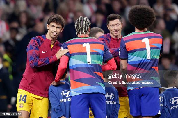 Joao Felix of FC Barcelona, Rodrigo De Paul of Atletico Madrid, Robert Lewandowski of FC Barcelona, Axel Witsel of Atletico Madrid during the LaLiga...