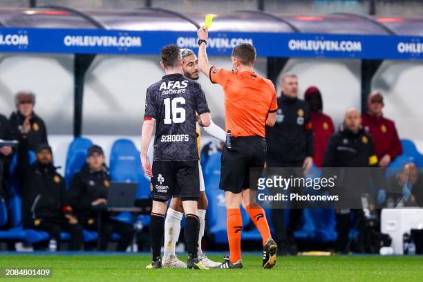 Maziz Youssef midfielder of OH Leuven receiving a yellow card from referee Lardot Jonathan during the Jupiler Pro League match between OH Leuven and...