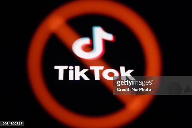 Ban sign displayed on a laptop screen and TikTok logo displayed on a phone screen are seen in this multiple exposure illustration photo taken in...